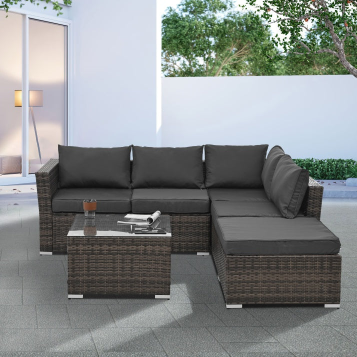 4-Piece PE Wicker Patio Furniture Set with Tempered Glass Coffee Table – Outdoor Conversation Set