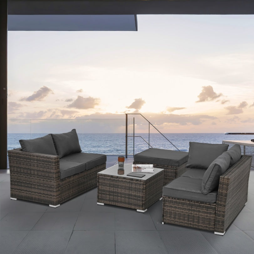 4-Piece PE Wicker Patio Furniture Set with Tempered Glass Coffee Table – Outdoor Conversation Set